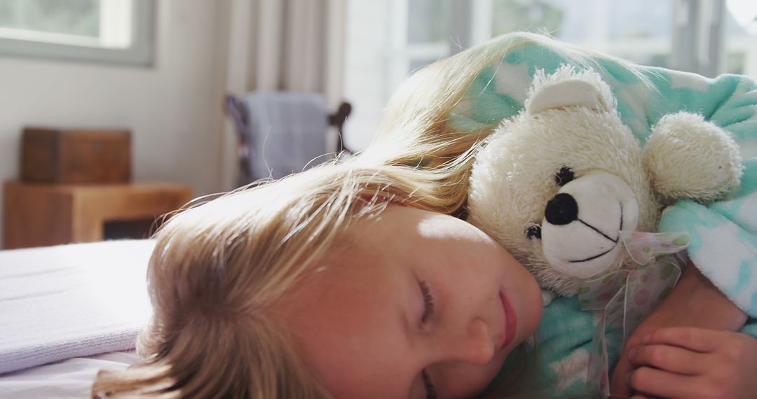 Little Girl Sleeping Peacefully with Toy Bear in Bed - Free Images, Stock Photos and Pictures on Pikwizard.com