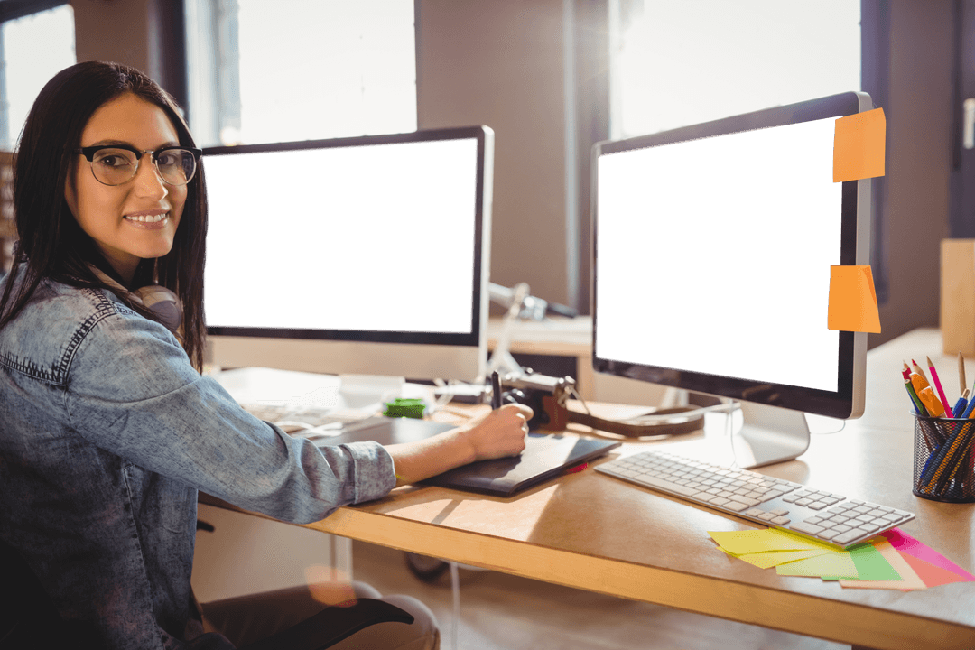 Businesswoman Smiling at Desk in Modern Office with Transparent Screen