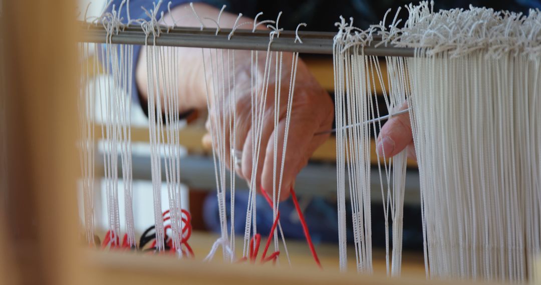 Traditional Hand Weaving, Close-Up of Artisan's Hands on Loom - Free Images, Stock Photos and Pictures on Pikwizard.com