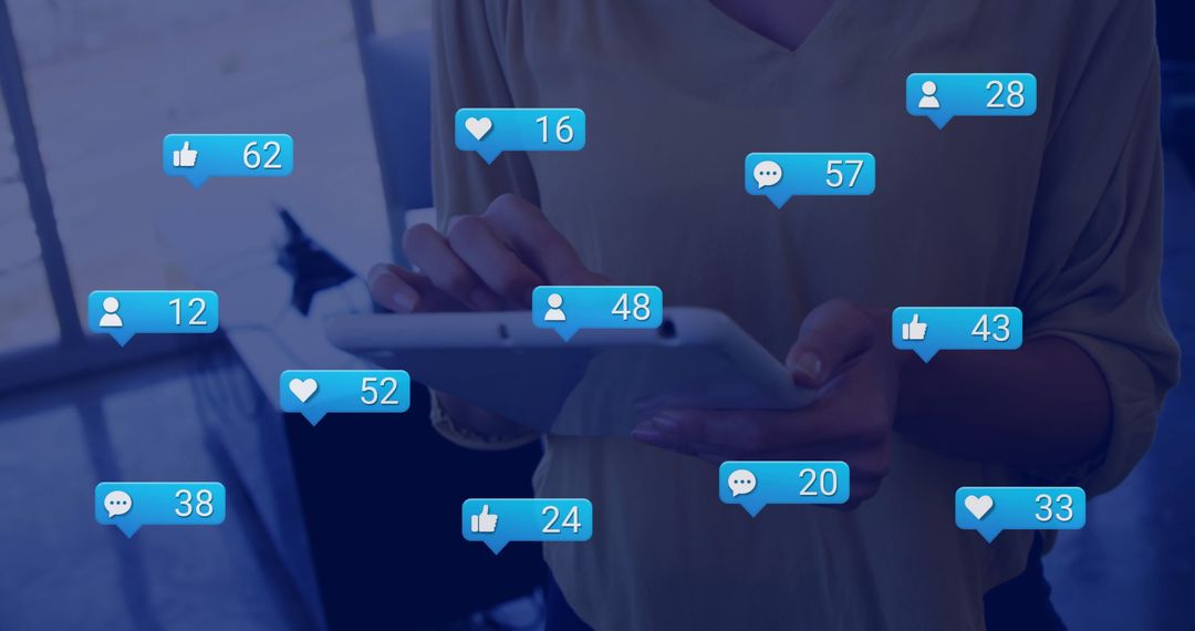 Hands Using Tablet with Social Media Icons Overlapping