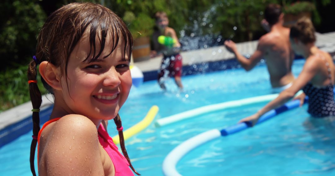 Smiling Girl Enjoying Swimming Pool on Summer Day - Free Images, Stock Photos and Pictures on Pikwizard.com