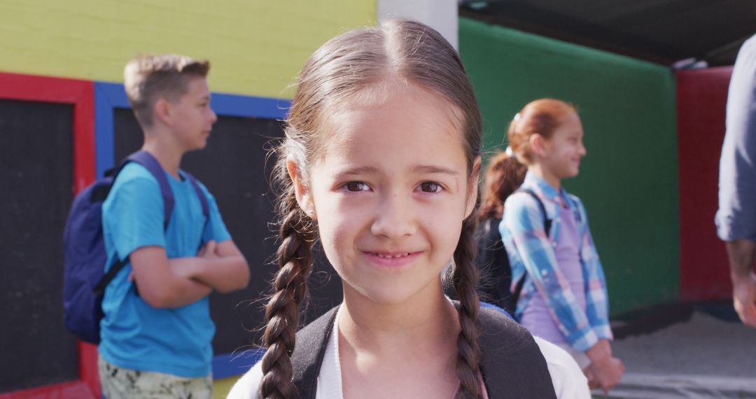 Smiling Schoolchildren in Colorful Playground Setting