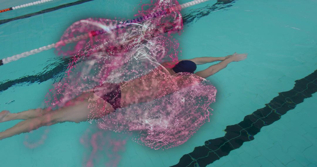 Athletic Male Swimmer Gliding Underwater with Vivid Particle Effect