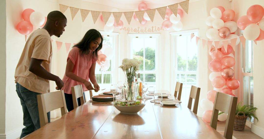 Group of Friends Setting Table for Celebration