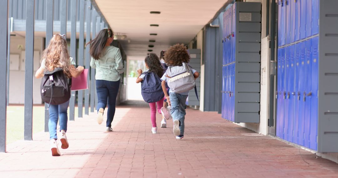 Students Rushing Through School Hallway with Excited Energy