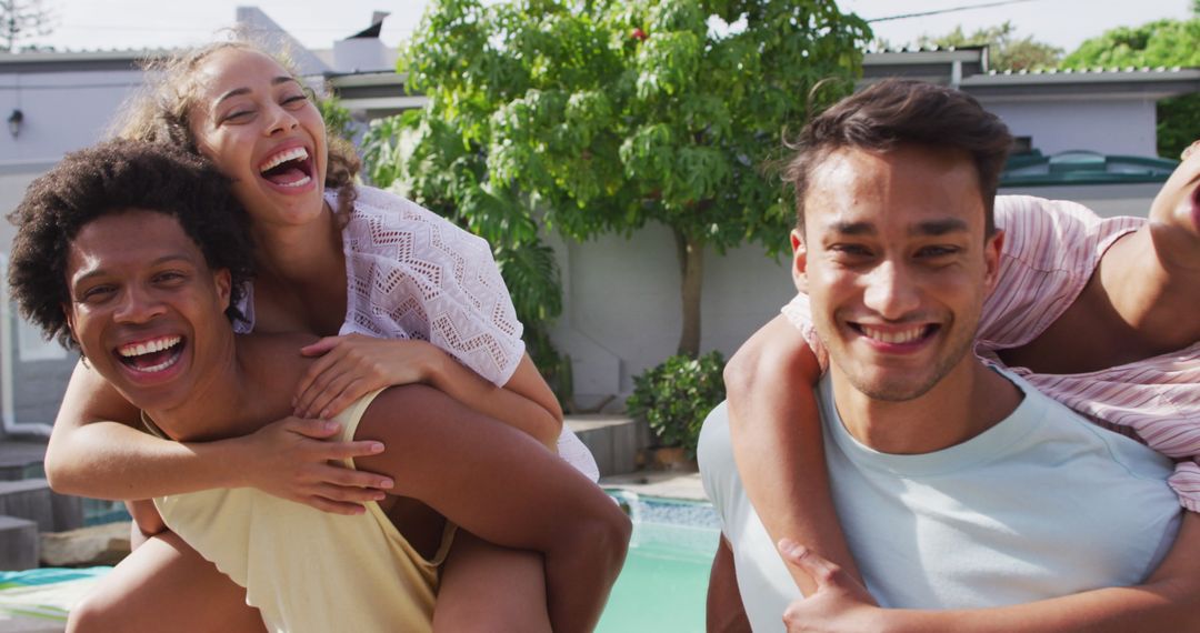 Diverse Friends Enjoying Laughter at Poolside Get-Together