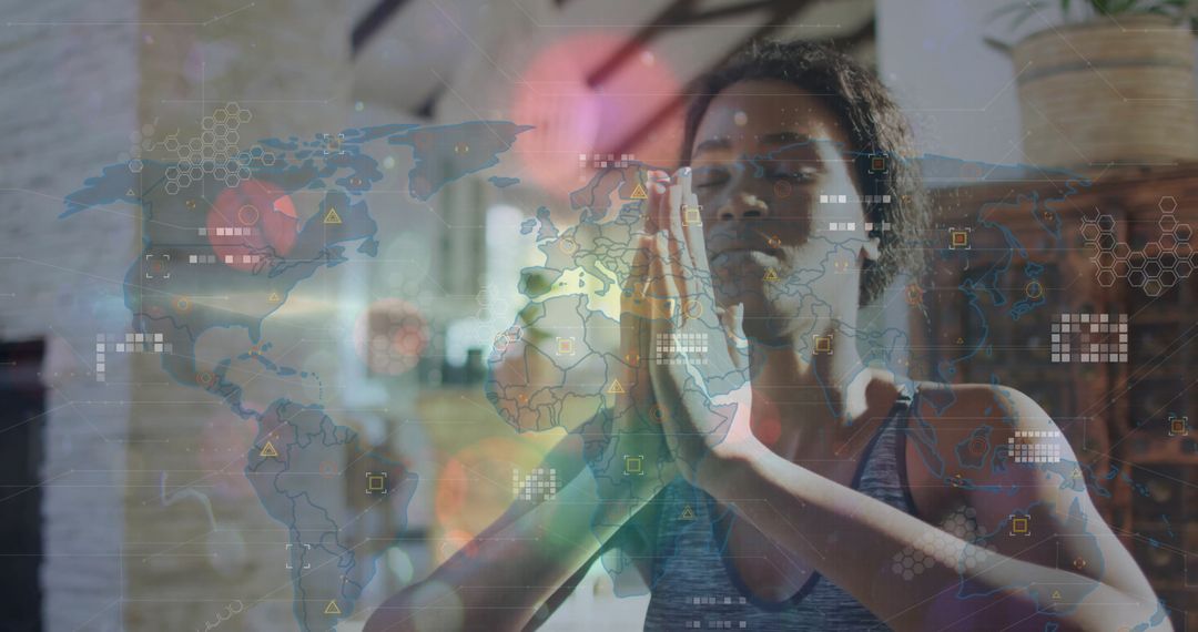 Meditating Woman with Technological Overlay in Yoga Studio