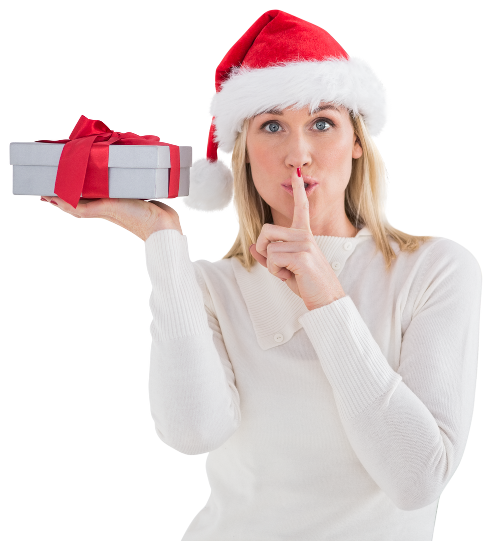 Smiling Woman with Santa Hat Holding Gift Making Quiet Gesture on Transparent Background - Download Free Stock Images Pikwizard.com