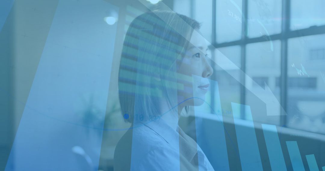 Businesswoman Analyzing Financial Data with Digital Graphs Overlay