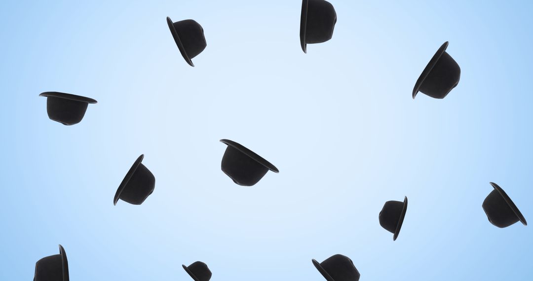 Image of black hats falling on blue background - Free Images, Stock Photos and Pictures on Pikwizard.com