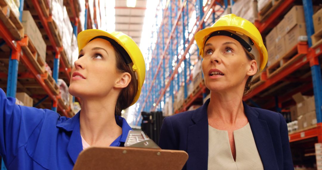 Female Employees Inspecting Inventory in Warehouse with Clipboard - Free Images, Stock Photos and Pictures on Pikwizard.com