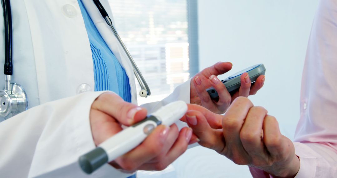 Doctor Testing Diabetes Glucose Levels on Patient with Glucometer - Free Images, Stock Photos and Pictures on Pikwizard.com