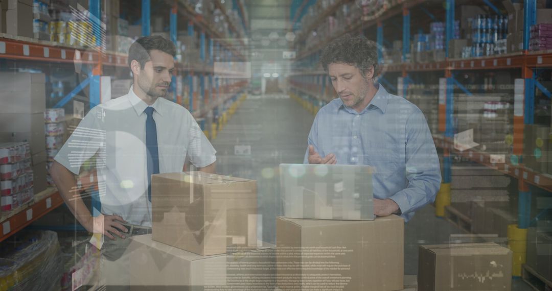 Warehouse Managers Analyzing Data Over Financial Graphs