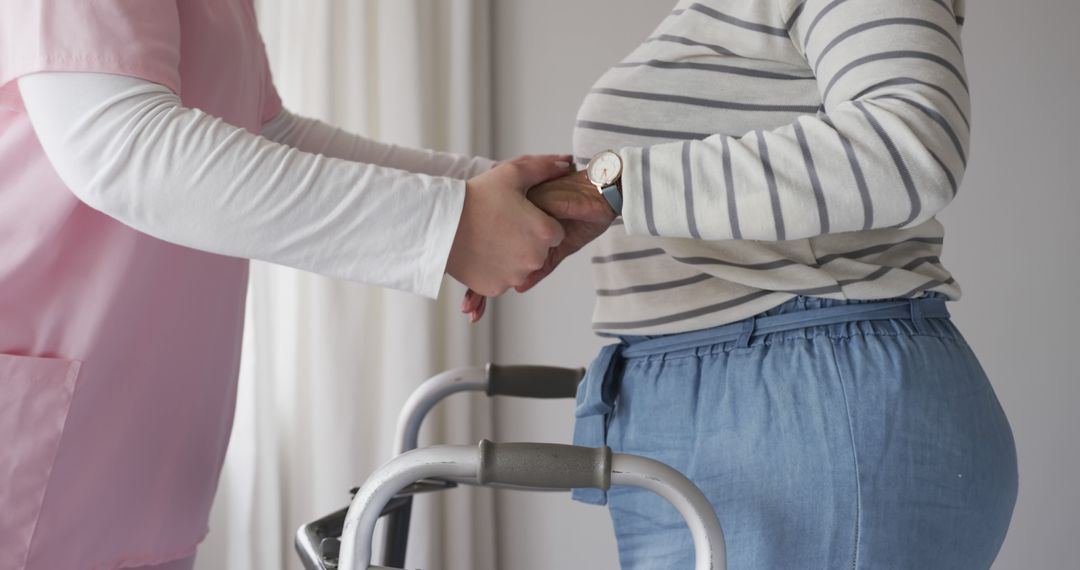 Caregiver Assisting Senior Woman with Walker Indoors - Free Images, Stock Photos and Pictures on Pikwizard.com