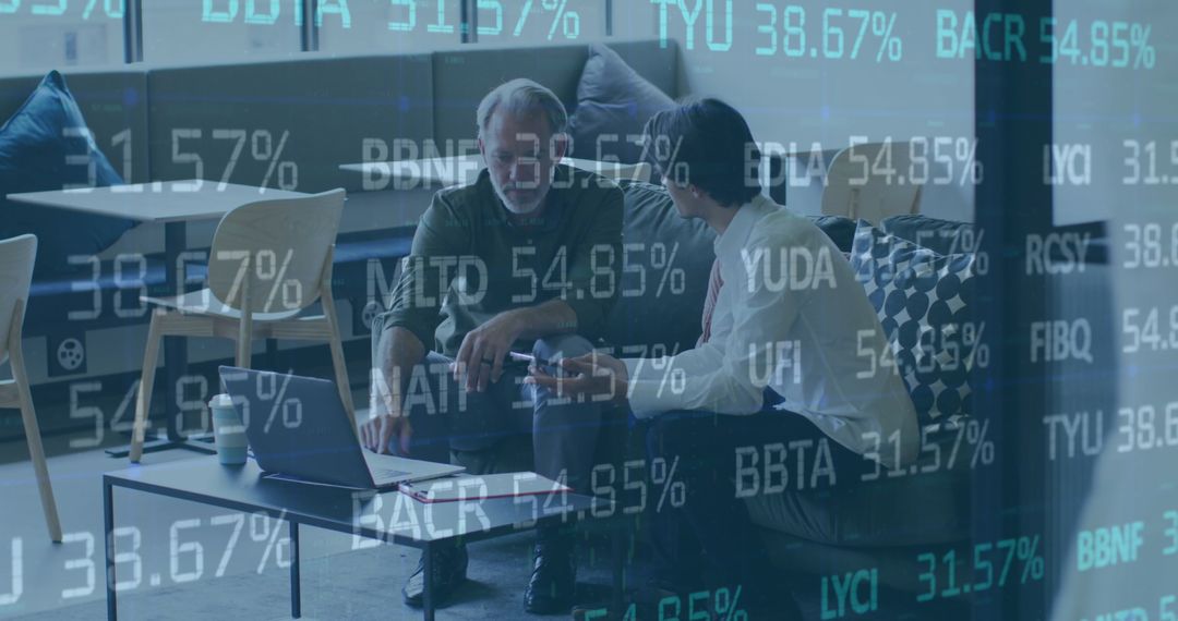 Two Businessmen Analyzing Market Data in Modern Office