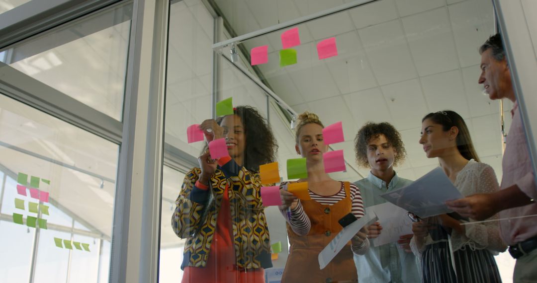 Creative Team Employing Agile Methodology with Colorful Sticky Notes