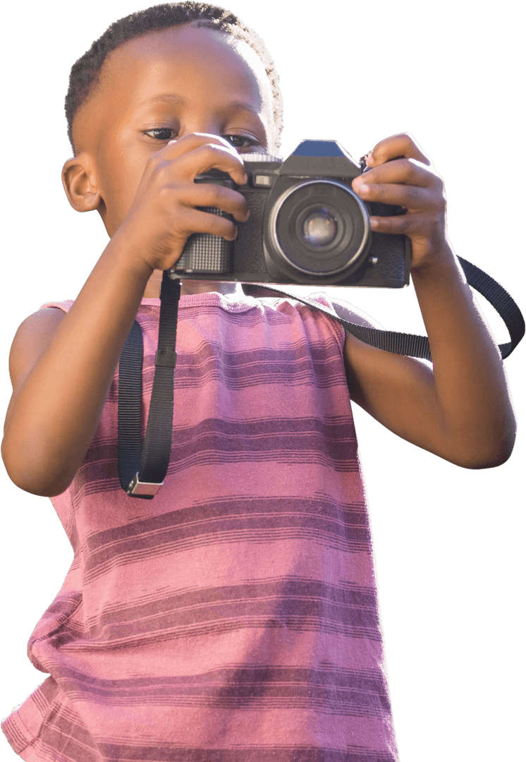 Child Enthusiastically Exploring Photography with Camera à Transparent Background