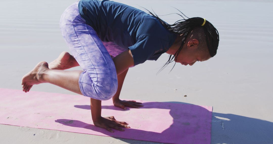 African American Woman Practicing Yoga on Beach - Free Images, Stock Photos and Pictures on Pikwizard.com