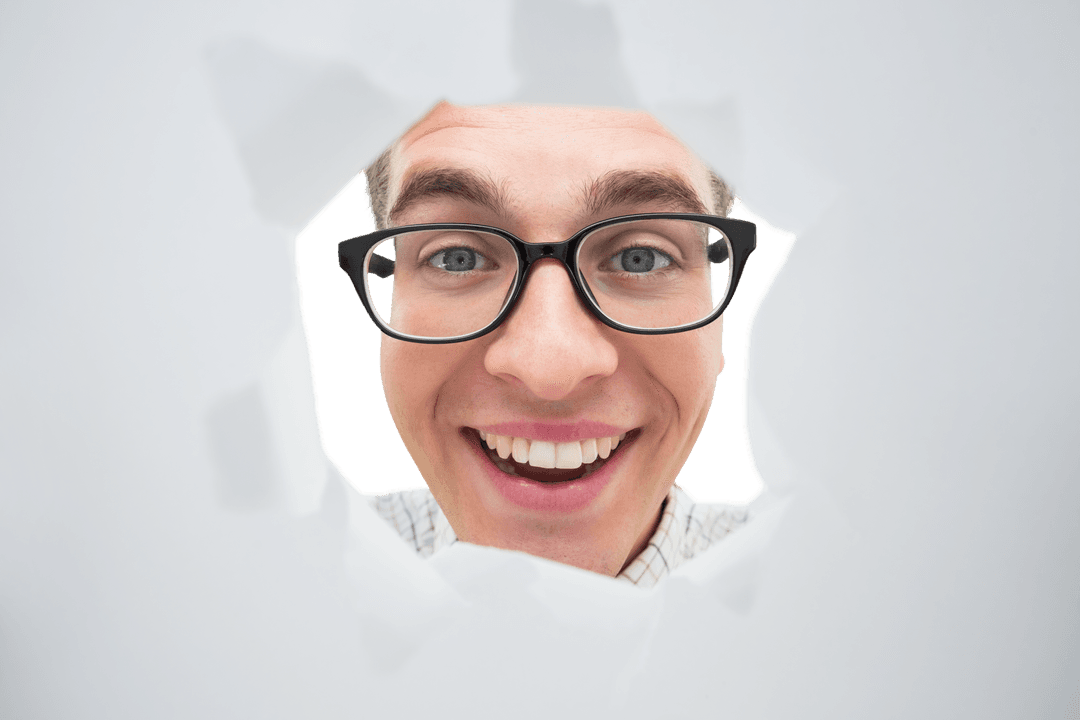 Geeky Man Smiling Through Torn Paper with Transparent Background - Download Free Stock Images Pikwizard.com