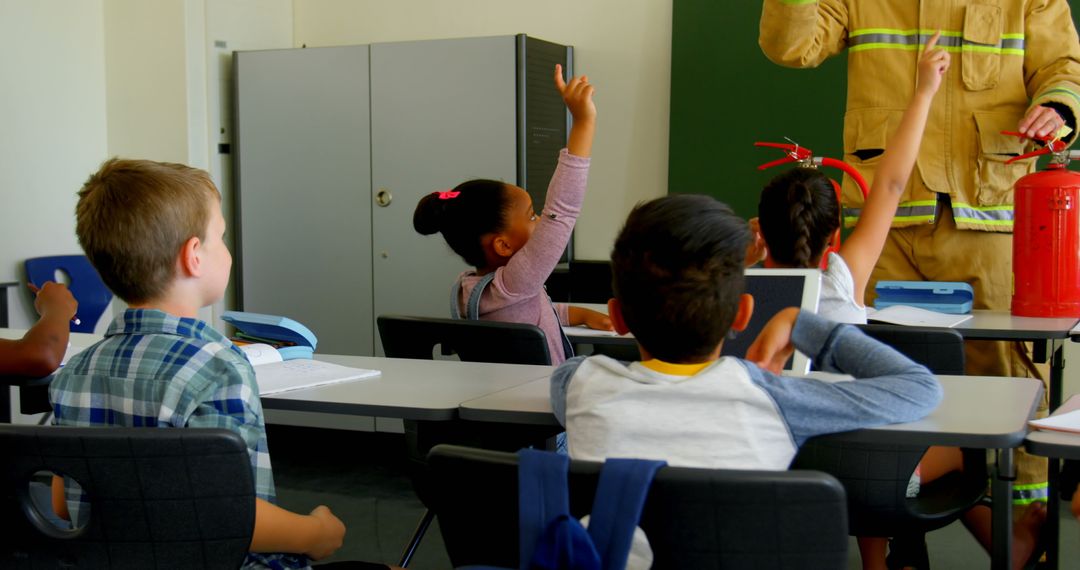 Diverse Children Participating in Fire Safety Lesson with Firefighter