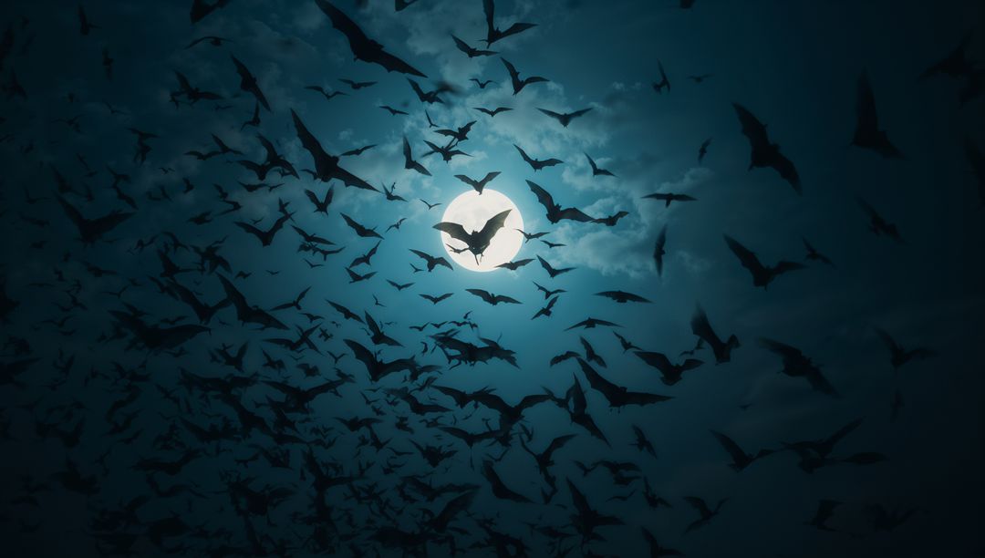 Silhouetted Bats Swarming Under Full Moonlit Sky