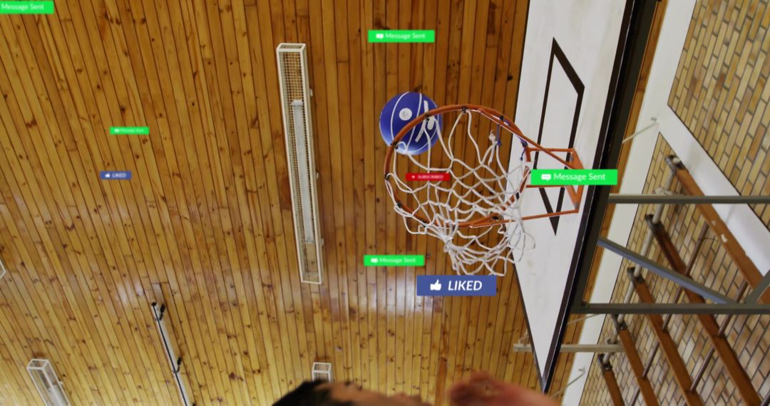 Sinking blue basketball through net with social media reactions in school gym