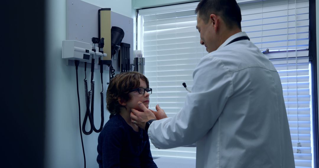 Doctor Examining Young Patient in Medical Clinic - Free Images, Stock Photos and Pictures on Pikwizard.com