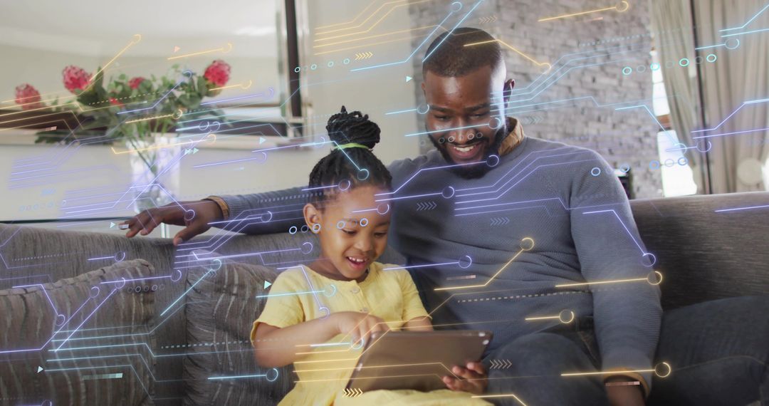 Guiding father and smiling daughter exploring tablet with holographic tech overlay in living room