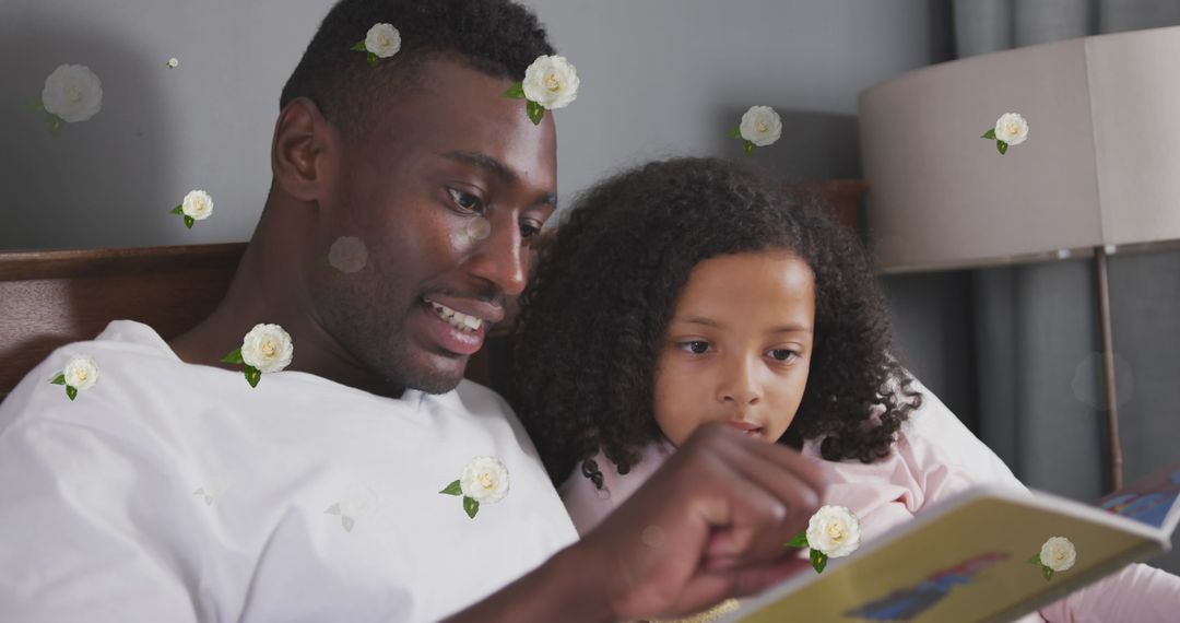 Father and Daughter Reading Book Together with Decorative Roses