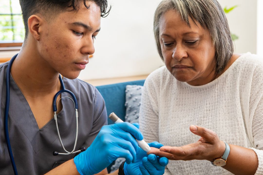 Healthcare Professional Conducting Blood Sugar Test for Senior Patient