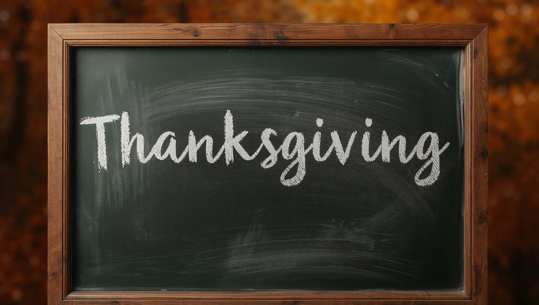 Thanksgiving Chalkboard Sign Displaying Handwritten Chalk Script on Rustic Wood Frame