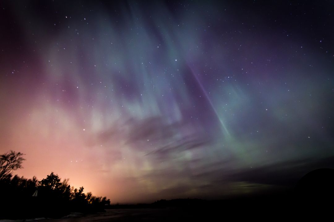 Mesmerizing Northern Lights Illuminating Night Sky - Free Images, Stock Photos and Pictures on Pikwizard.com