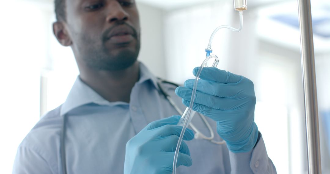 Healthcare Professional Administering IV in Hospital Setting