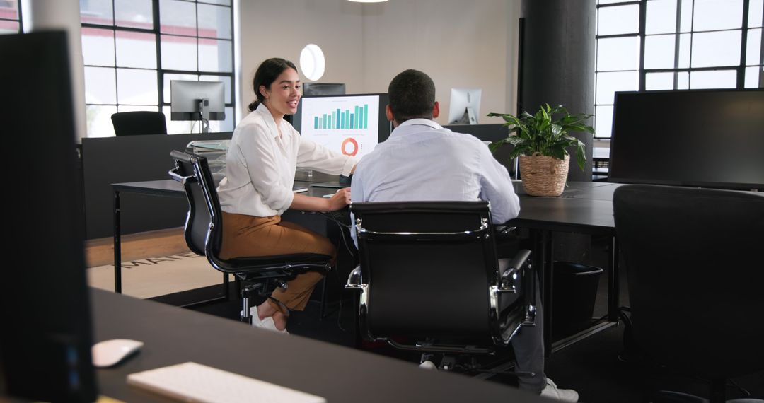Colleagues Collaborating in Modern Office on Business Project