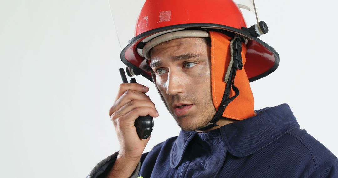 Firefighter Communicating Through Radio During Emergency - Free Images, Stock Photos and Pictures on Pikwizard.com