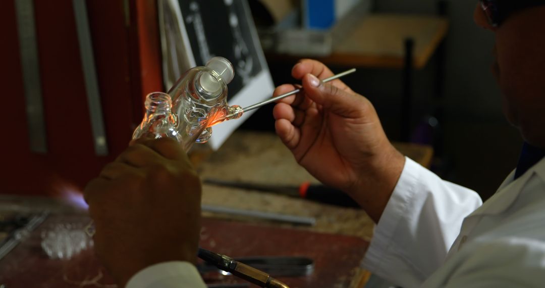 Scientist Working on Glass Instruments in Laboratory - Free Images, Stock Photos and Pictures on Pikwizard.com