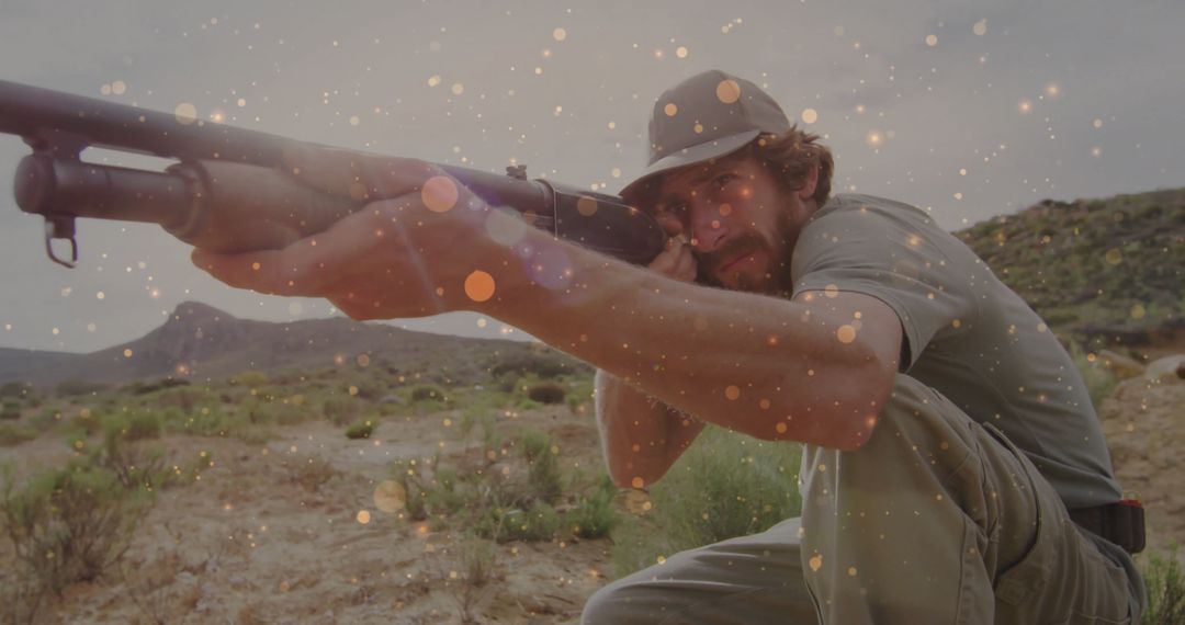 Hunter Crouching in Desert Aiming Shotgun with Sparkle Overlay