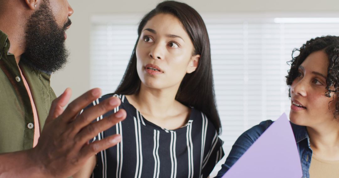 Diverse Group Discussing Creative Ideas at Home Workspace