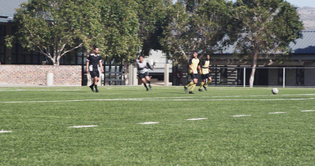 Diverse Soccer Team Playing Intense Match Outdoors