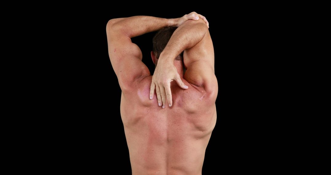 Man Stretching Arm Showing Muscle and Flexibility