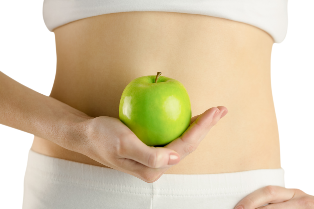 Front View of Slim Woman Holding Green Apple Displaying Transparent WIst - Download Free Stock Images Pikwizard.com