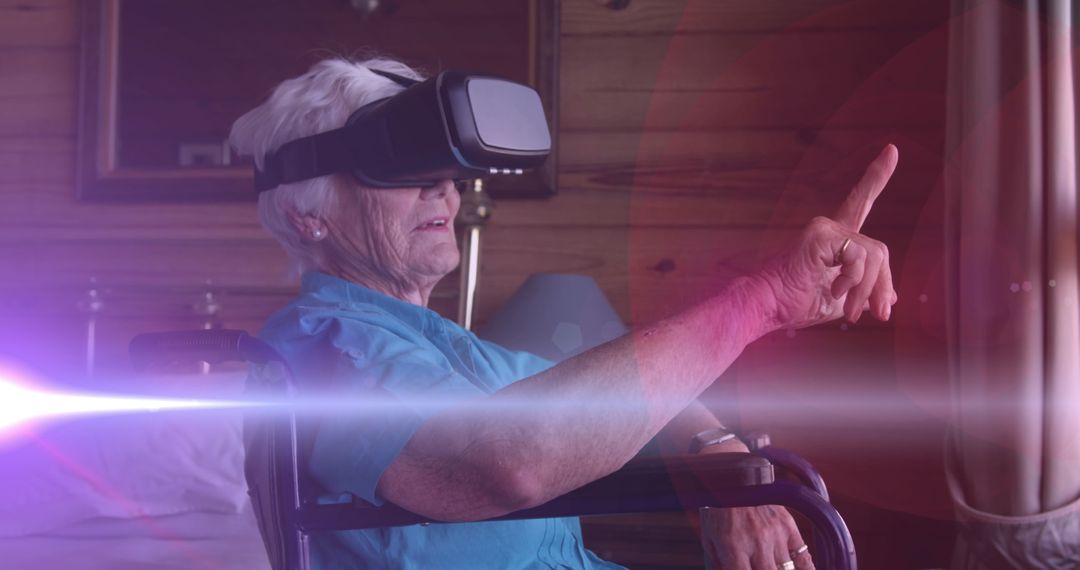 Senior Woman in Wheelchair Engaging with Virtual Reality Technology
