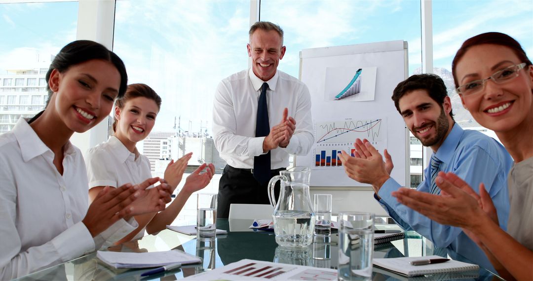 Business Team Applauding During Meeting Presentation - Free Images, Stock Photos and Pictures on Pikwizard.com