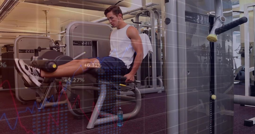 Man Using Leg Extension Machine Focused on Quad Training in Gym