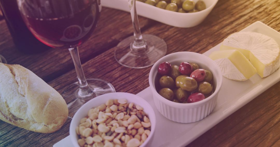 Wine and Snack Arrangement on Rustic Wooden Table