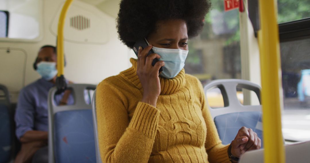Businesswoman Wearing Mask Talking on Smartphone in Bus During Pandemic