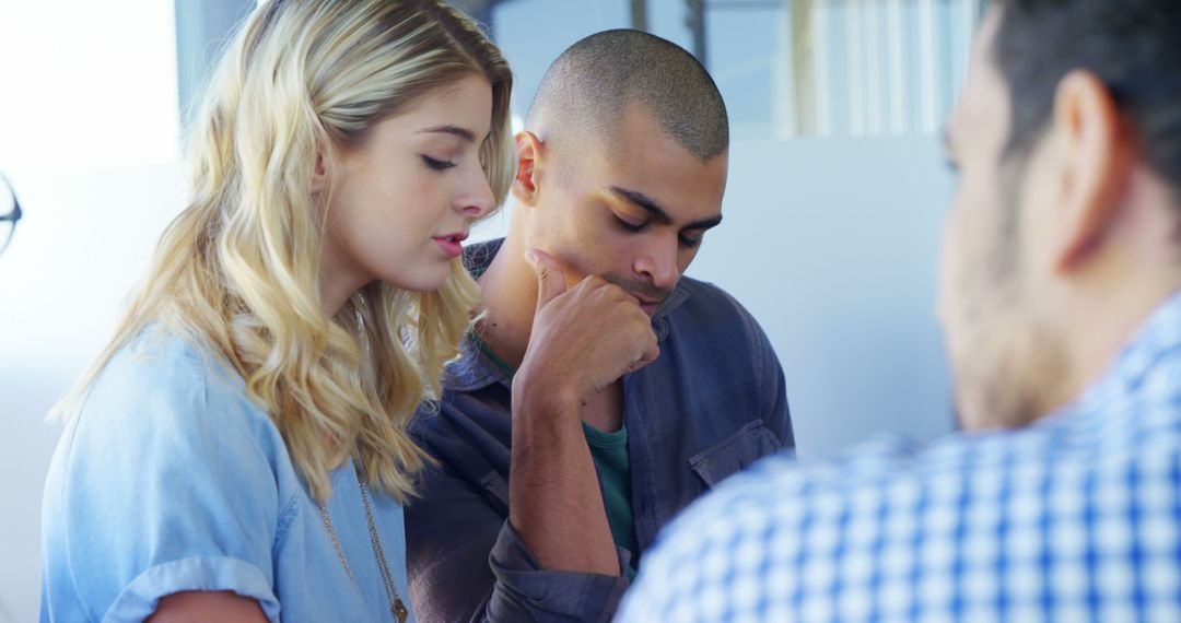 Young Professionals in Deep Conversation Analyzing Business Solutions