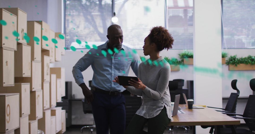 Coworkers Analyzing Business Growth Data in Office