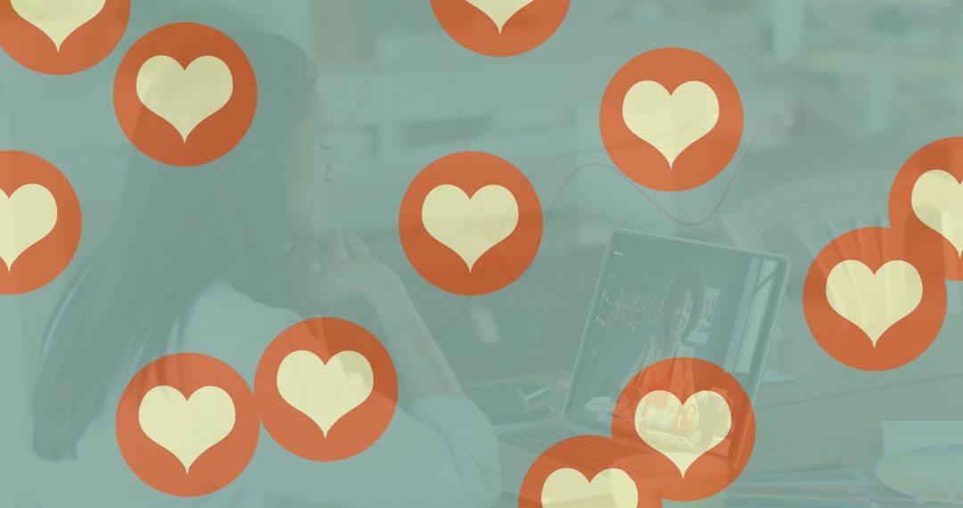 Woman Engaged with Social Media on Laptop Featuring Heart Icons