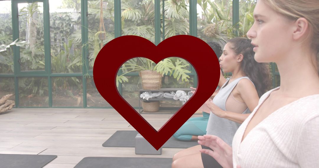 Practicing Heart-Centered Breathwork in Sunlit Greenhouse Yoga Class